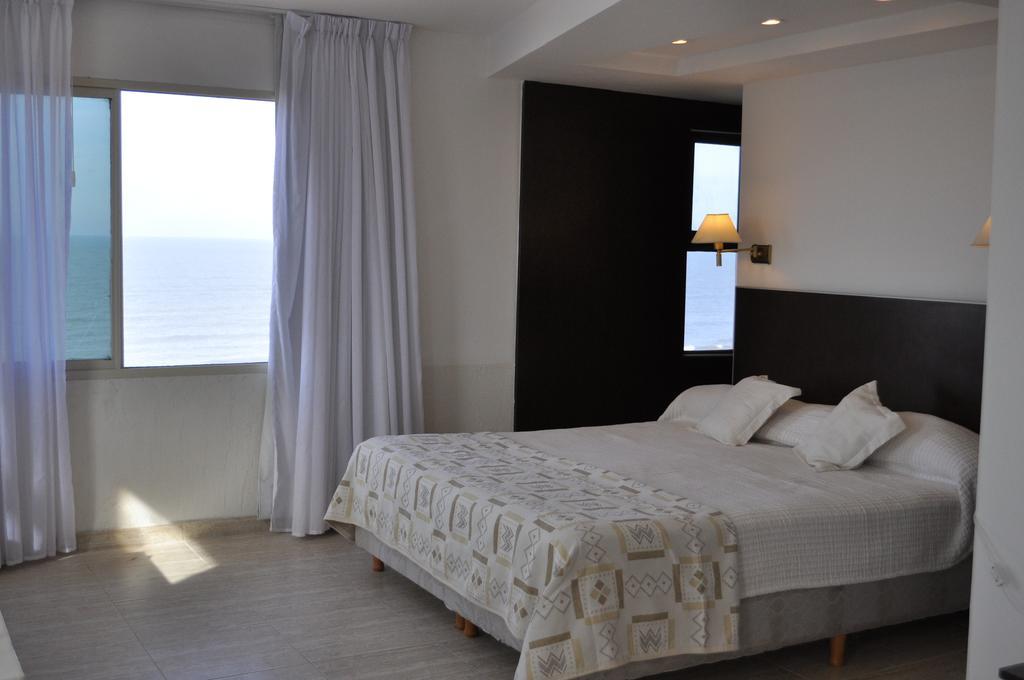 Hotel Golf Internacional Santa Teresita Habitación foto